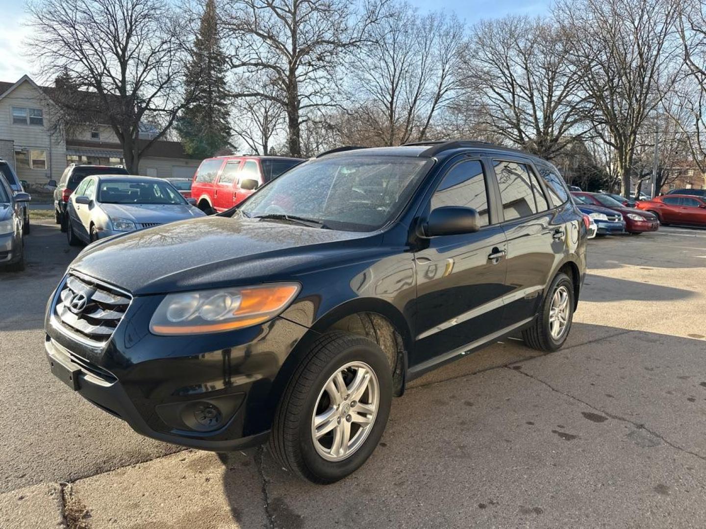 2011 BLACK HYUNDAI SANTA FE GLS (5XYZG3AB5BG) with an 2.4L engine, Automatic transmission, located at 1708 Broadway, Rockford, IL, 61104, (815) 397-5010, 42.252522, -89.069359 - Photo#0