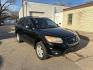 2011 BLACK HYUNDAI SANTA FE GLS (5XYZG3AB5BG) with an 2.4L engine, Automatic transmission, located at 1708 Broadway, Rockford, IL, 61104, (815) 397-5010, 42.252522, -89.069359 - Photo#4