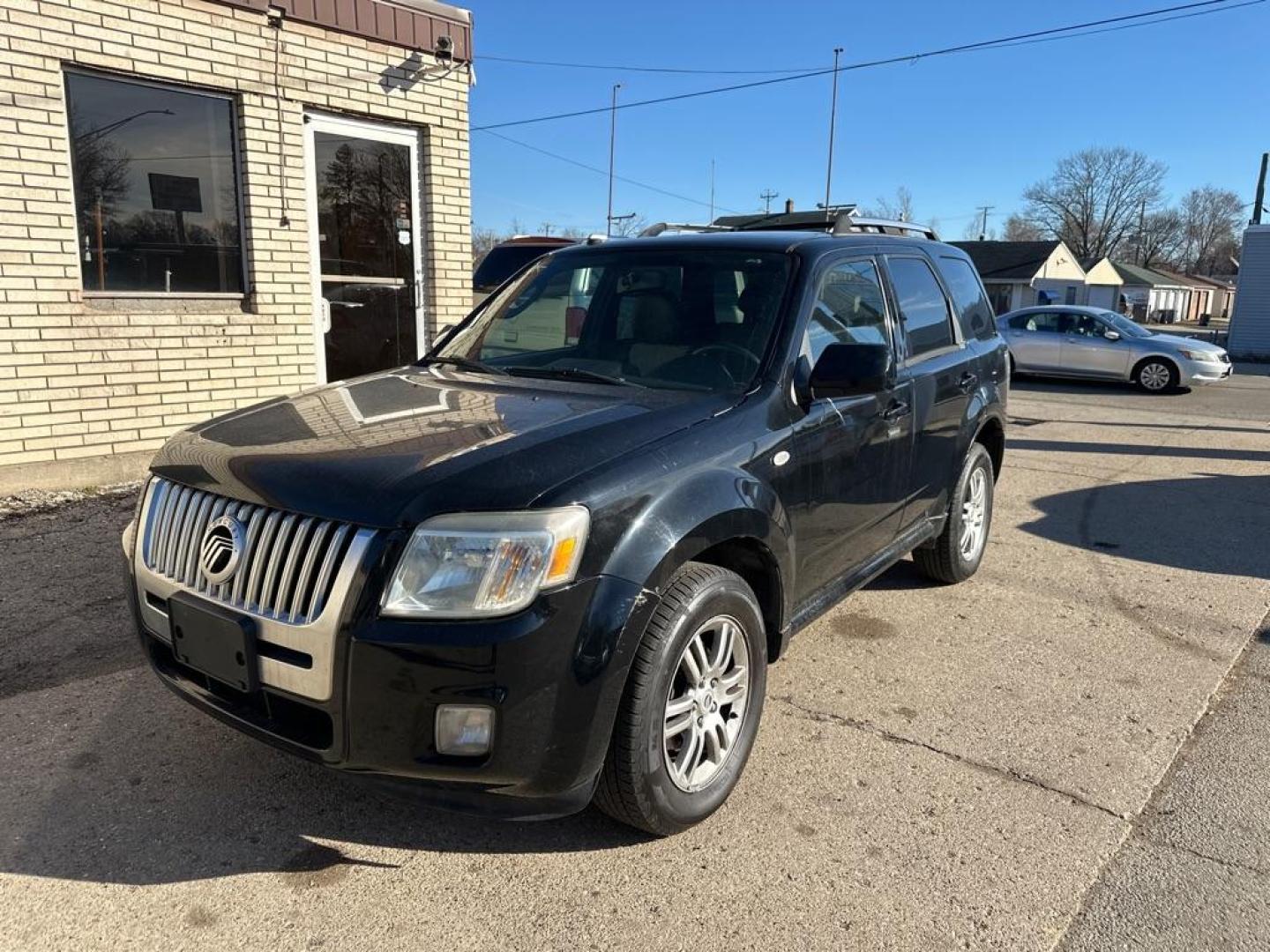 2009 BLACK MERCURY MARINER PREMIER (4M2CU97G09K) with an 3.0L engine, Automatic transmission, located at 1708 Broadway, Rockford, IL, 61104, (815) 397-5010, 42.252522, -89.069359 - Photo#0