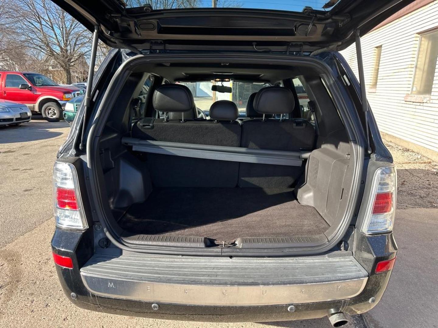 2009 BLACK MERCURY MARINER PREMIER (4M2CU97G09K) with an 3.0L engine, Automatic transmission, located at 1708 Broadway, Rockford, IL, 61104, (815) 397-5010, 42.252522, -89.069359 - Photo#13