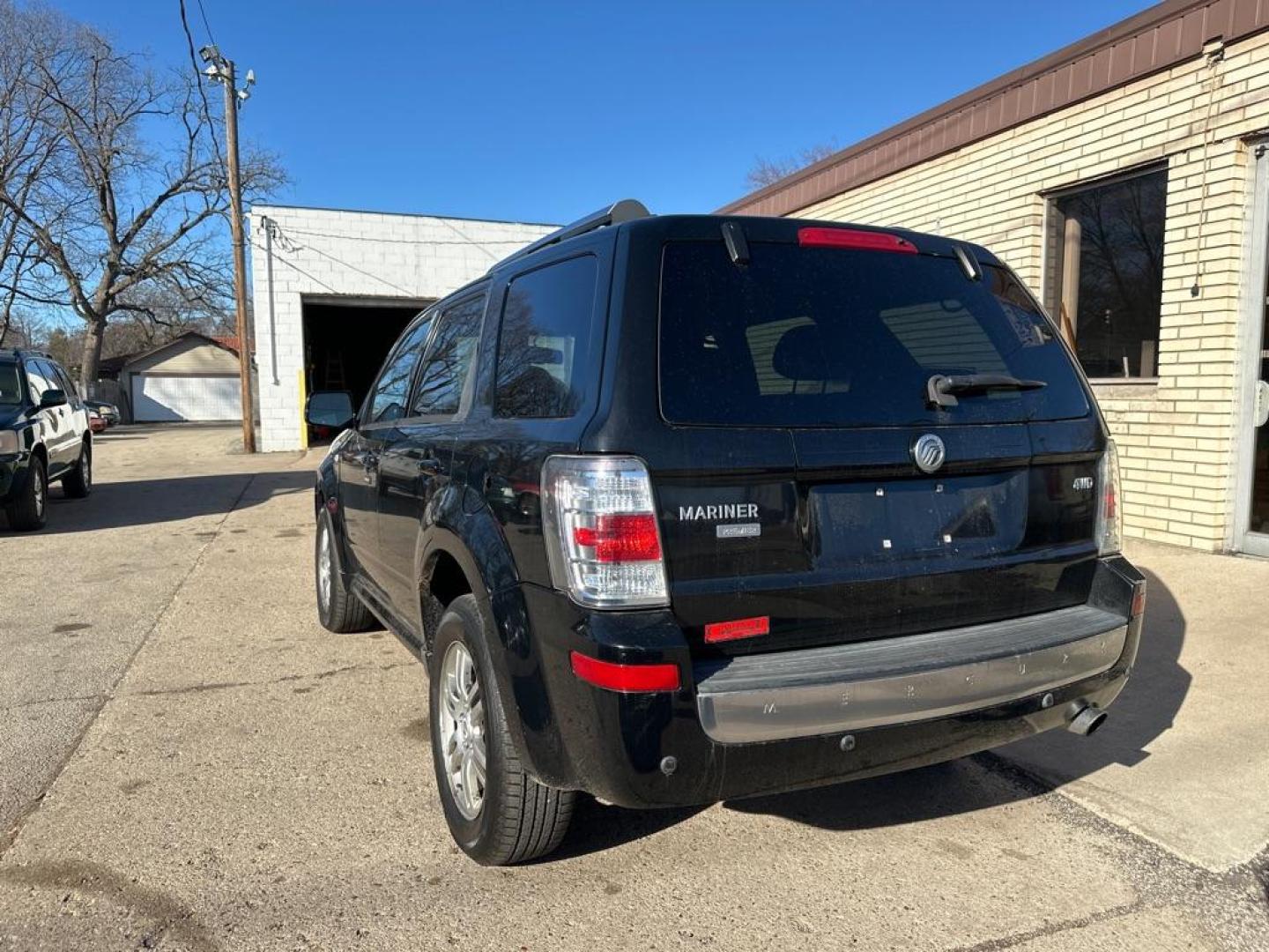 2009 BLACK MERCURY MARINER PREMIER (4M2CU97G09K) with an 3.0L engine, Automatic transmission, located at 1708 Broadway, Rockford, IL, 61104, (815) 397-5010, 42.252522, -89.069359 - Photo#1