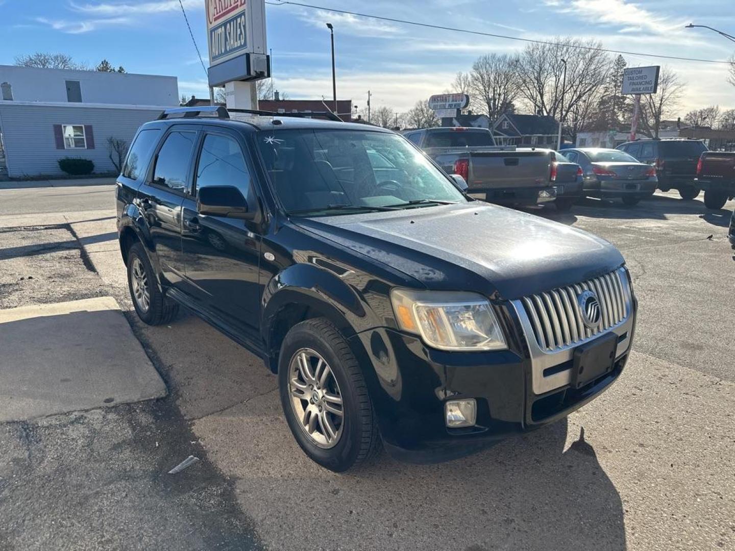 2009 BLACK MERCURY MARINER PREMIER (4M2CU97G09K) with an 3.0L engine, Automatic transmission, located at 1708 Broadway, Rockford, IL, 61104, (815) 397-5010, 42.252522, -89.069359 - Photo#3