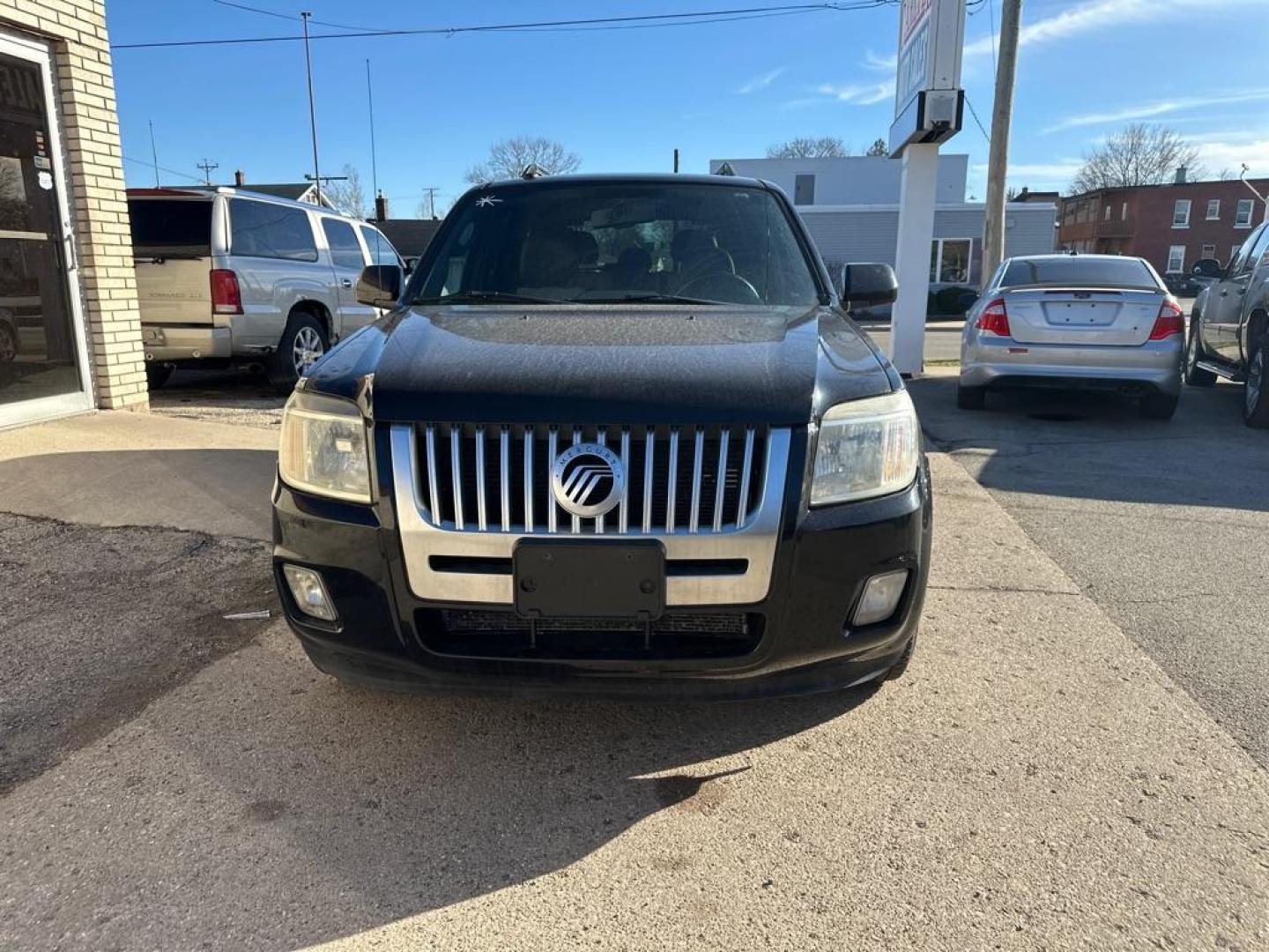 2009 BLACK MERCURY MARINER PREMIER (4M2CU97G09K) with an 3.0L engine, Automatic transmission, located at 1708 Broadway, Rockford, IL, 61104, (815) 397-5010, 42.252522, -89.069359 - Photo#4