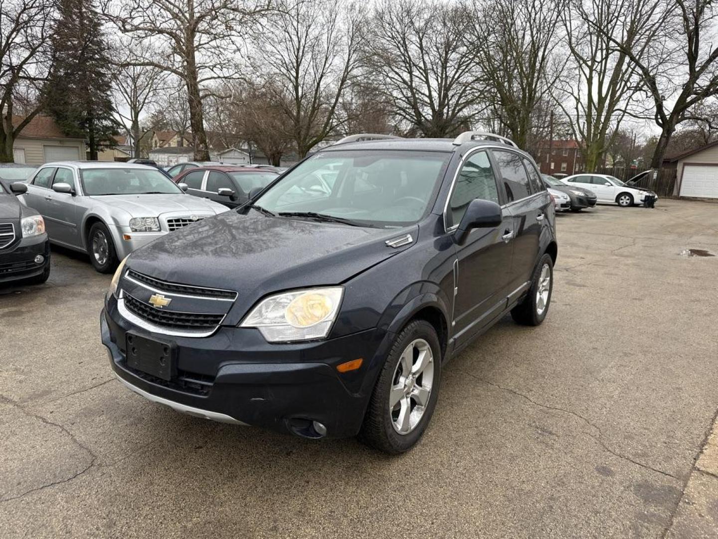 2014 BLUE CHEVROLET CAPTIVA LT (3GNAL3EK9ES) with an 2.4L engine, Automatic transmission, located at 1708 Broadway, Rockford, IL, 61104, (815) 397-5010, 42.252522, -89.069359 - Photo#0