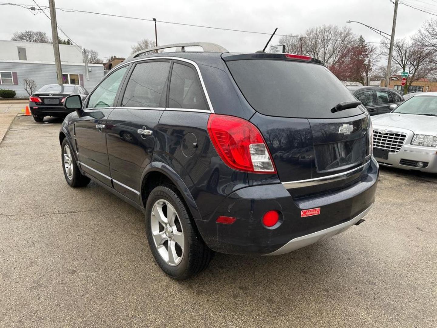 2014 BLUE CHEVROLET CAPTIVA LT (3GNAL3EK9ES) with an 2.4L engine, Automatic transmission, located at 1708 Broadway, Rockford, IL, 61104, (815) 397-5010, 42.252522, -89.069359 - Photo#1