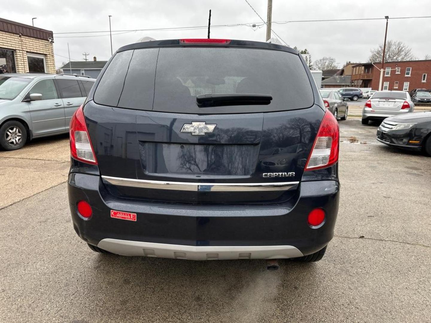 2014 BLUE CHEVROLET CAPTIVA LT (3GNAL3EK9ES) with an 2.4L engine, Automatic transmission, located at 1708 Broadway, Rockford, IL, 61104, (815) 397-5010, 42.252522, -89.069359 - Photo#2