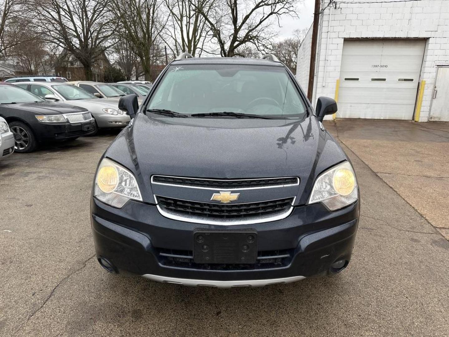 2014 BLUE CHEVROLET CAPTIVA LT (3GNAL3EK9ES) with an 2.4L engine, Automatic transmission, located at 1708 Broadway, Rockford, IL, 61104, (815) 397-5010, 42.252522, -89.069359 - Photo#5