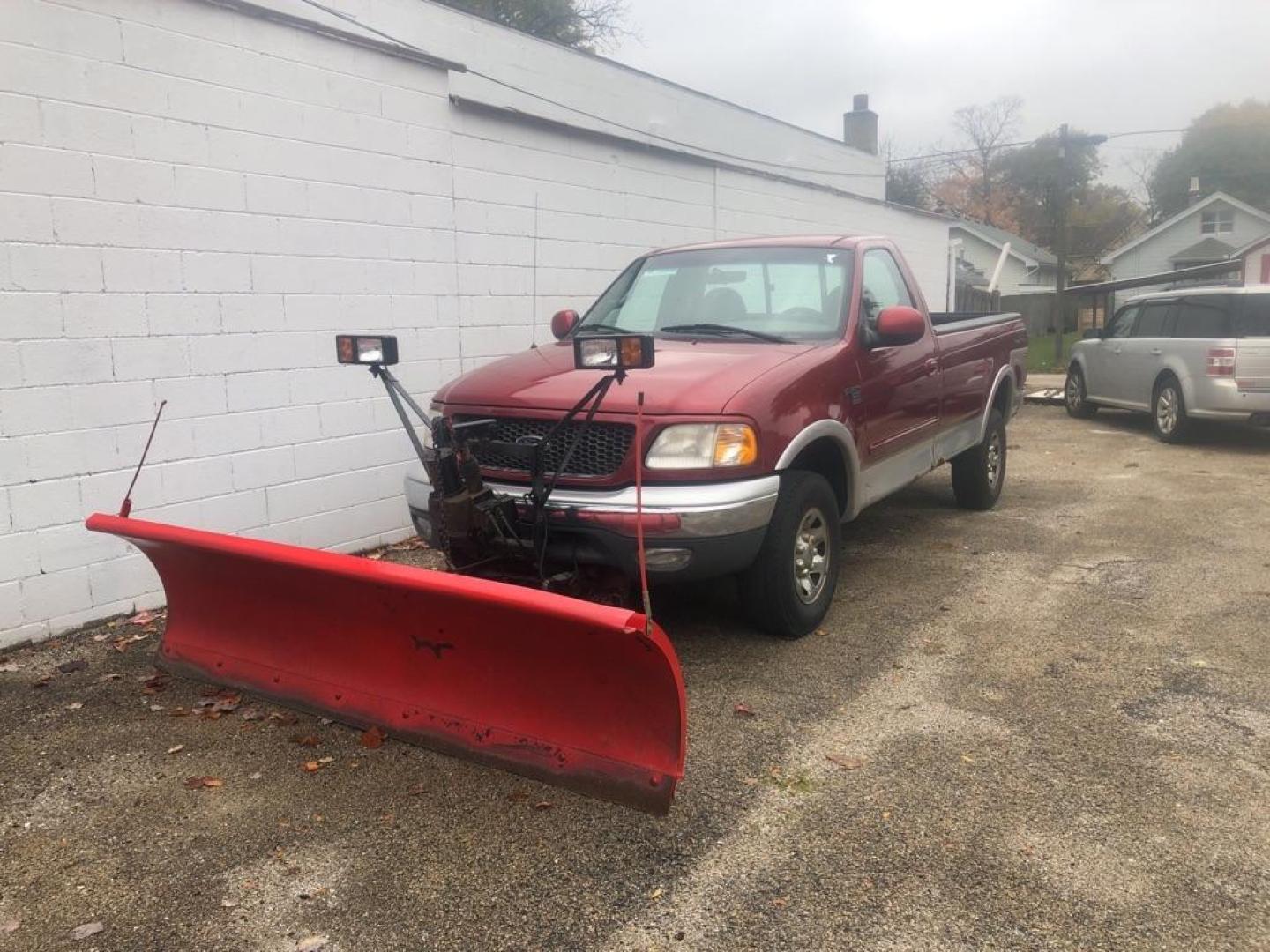 2000 RED FORD F150 (1FTPF18L6YN) with an 5.4L engine, Automatic transmission, located at 1708 Broadway, Rockford, IL, 61104, (815) 397-5010, 42.252522, -89.069359 - Photo#0