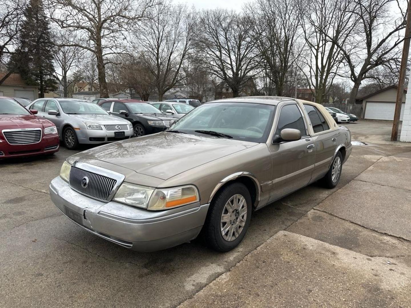 2005 TAN MERCURY GRAND MARQUIS GS (2MEFM74W95X) with an 4.6L engine, Automatic transmission, located at 1708 Broadway, Rockford, IL, 61104, (815) 397-5010, 42.252522, -89.069359 - Photo#0