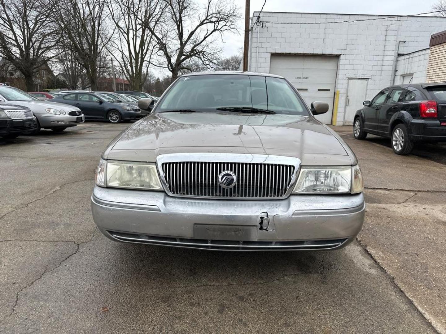 2005 TAN MERCURY GRAND MARQUIS GS (2MEFM74W95X) with an 4.6L engine, Automatic transmission, located at 1708 Broadway, Rockford, IL, 61104, (815) 397-5010, 42.252522, -89.069359 - Photo#6