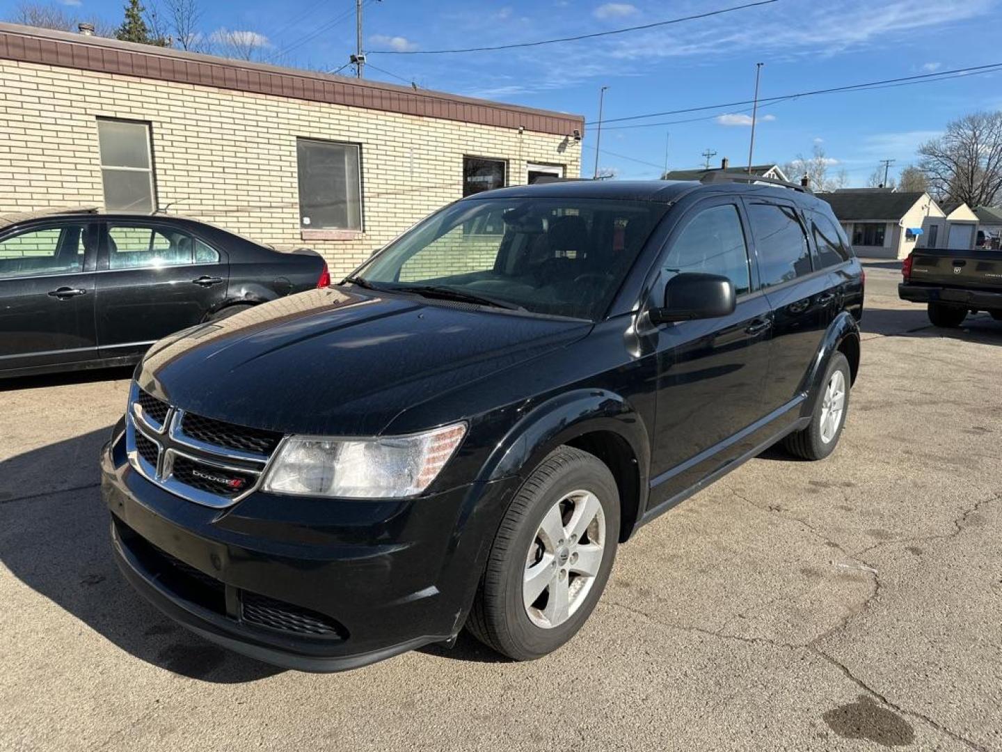 2018 BLACK DODGE JOURNEY SE (3C4PDCAB3JT) with an 2.4L engine, Automatic transmission, located at 1708 Broadway, Rockford, IL, 61104, (815) 397-5010, 42.252522, -89.069359 - Photo#0