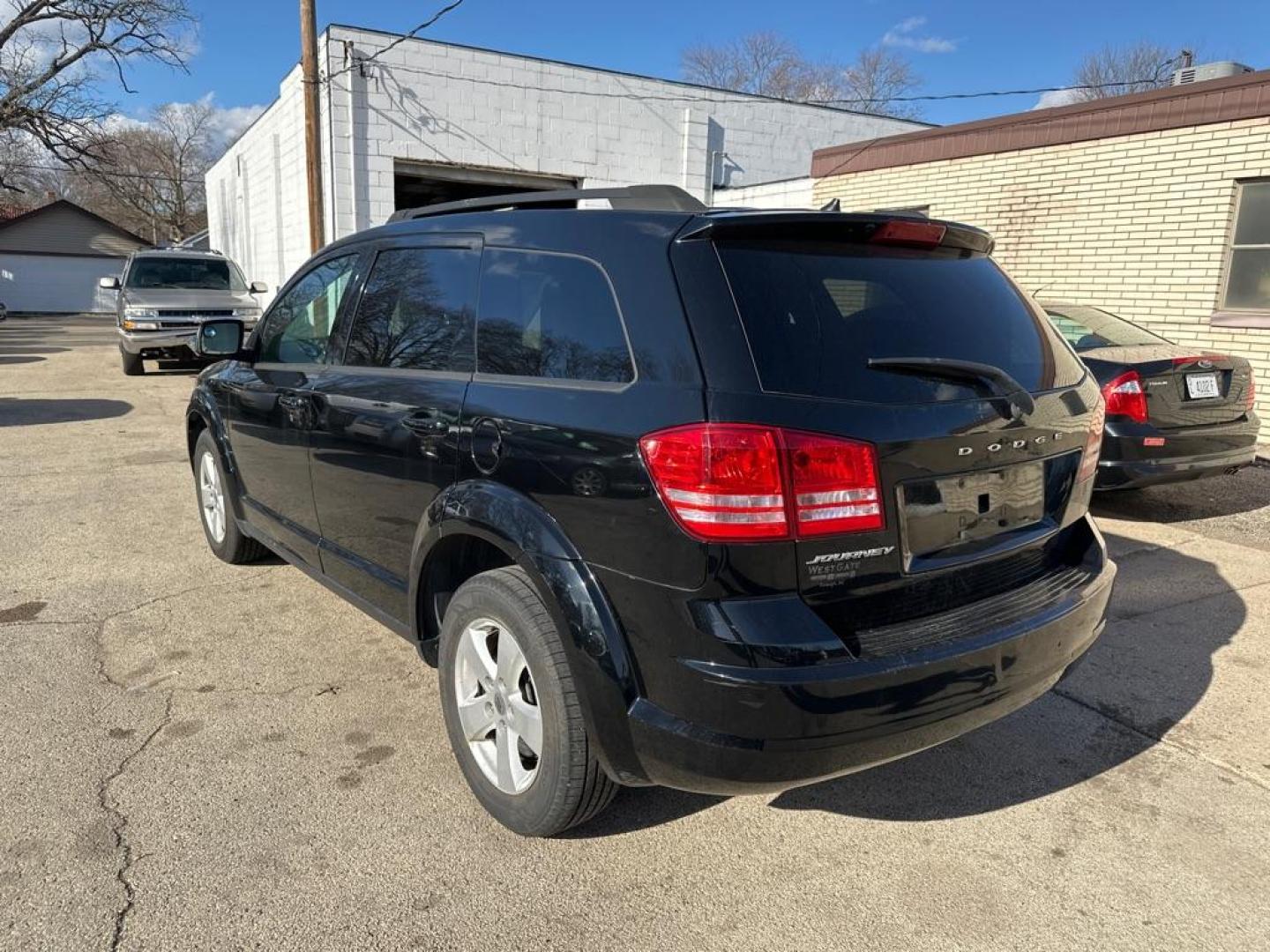 2018 BLACK DODGE JOURNEY SE (3C4PDCAB3JT) with an 2.4L engine, Automatic transmission, located at 1708 Broadway, Rockford, IL, 61104, (815) 397-5010, 42.252522, -89.069359 - Photo#1