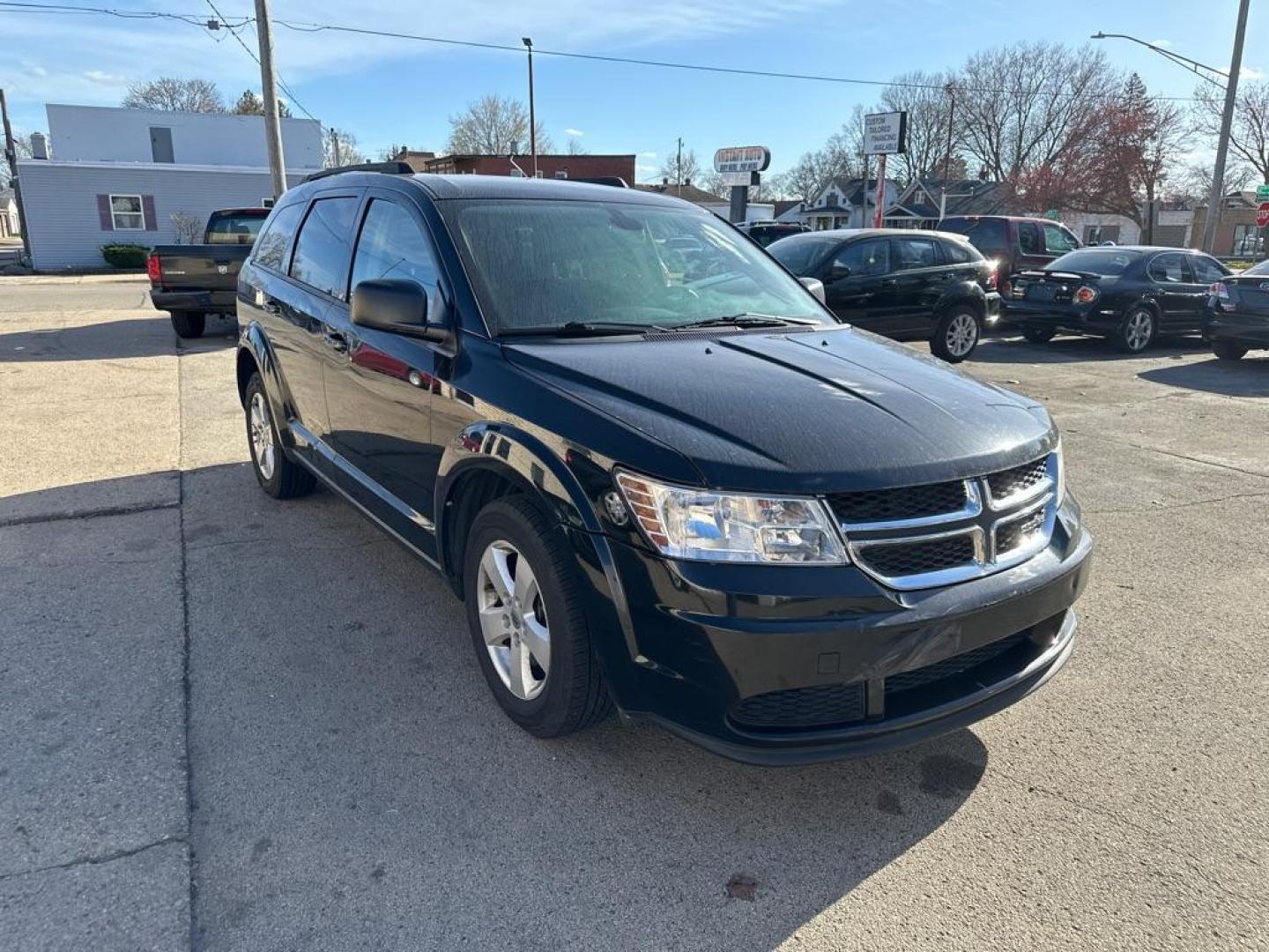 2018 BLACK DODGE JOURNEY SE (3C4PDCAB3JT) with an 2.4L engine, Automatic transmission, located at 1708 Broadway, Rockford, IL, 61104, (815) 397-5010, 42.252522, -89.069359 - Photo#4