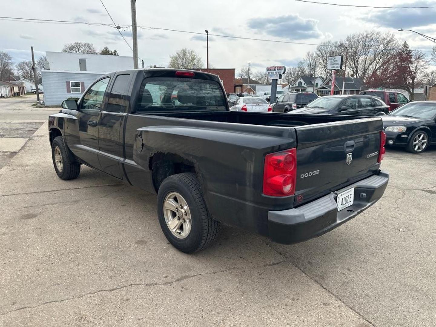 2009 BLACK DODGE DAKOTA ST (1D7HE22K29S) with an 3.7L engine, 6-Speed Manual transmission, located at 1708 Broadway, Rockford, IL, 61104, (815) 397-5010, 42.252522, -89.069359 - Photo#1