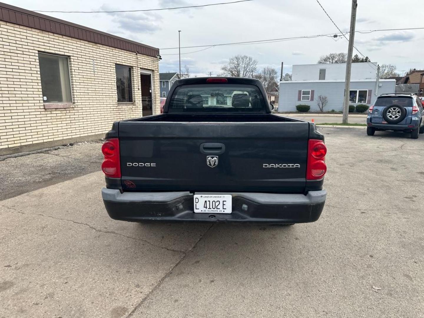 2009 BLACK DODGE DAKOTA ST (1D7HE22K29S) with an 3.7L engine, 6-Speed Manual transmission, located at 1708 Broadway, Rockford, IL, 61104, (815) 397-5010, 42.252522, -89.069359 - Photo#2