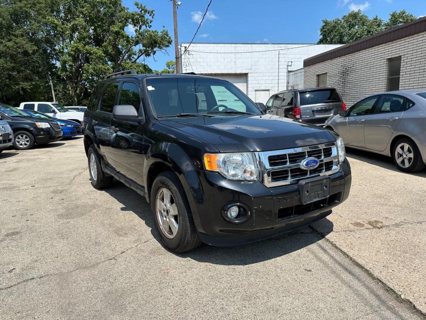 2011 BLACK FORD ESCAPE XLT (1FMCU9D79BK) with an 2.5L engine, Automatic transmission, located at 1708 Broadway, Rockford, IL, 61104, (815) 397-5010, 42.252522, -89.069359 - Photo#0