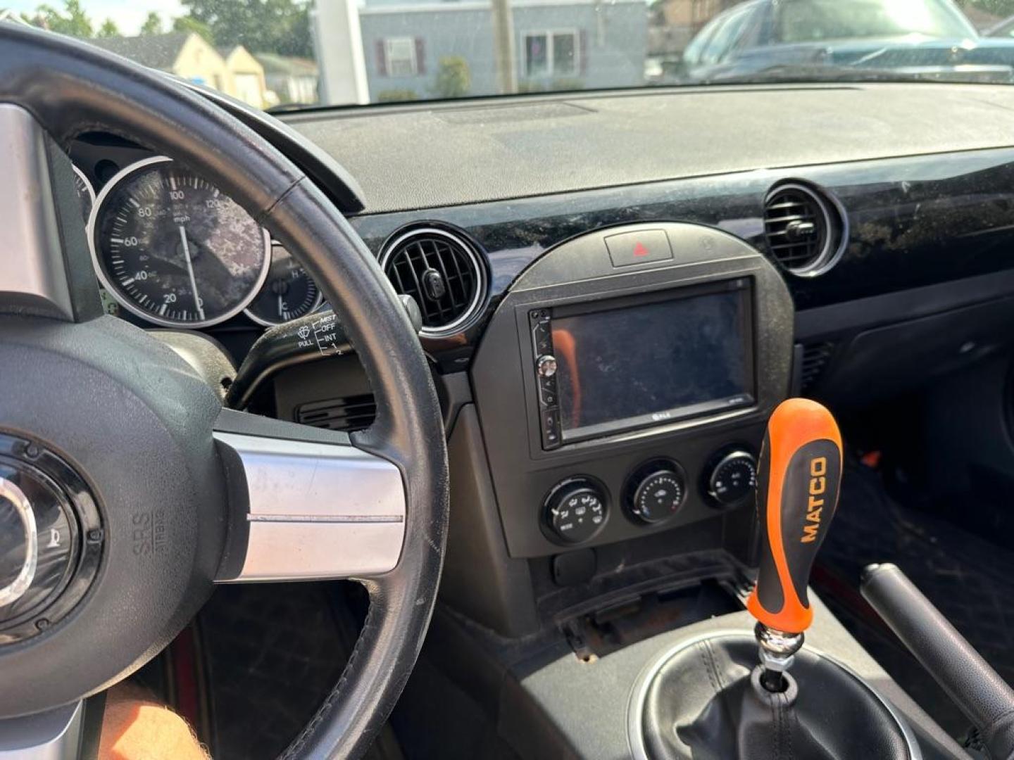 2006 BLACK MAZDA MX-5 MIATA (JM1NC25F760) with an 2.0L engine, 6-Speed Manual transmission, located at 1708 Broadway, Rockford, IL, 61104, (815) 397-5010, 42.252522, -89.069359 - Photo#8