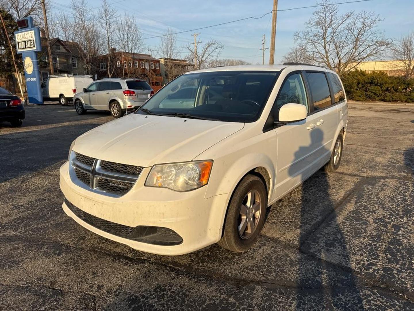 2012 WHITE DODGE GRAND CARAVAN SXT (2C4RDGCG4CR) with an 3.6L engine, Automatic transmission, located at 1708 Broadway, Rockford, IL, 61104, (815) 397-5010, 42.252522, -89.069359 - Photo#0