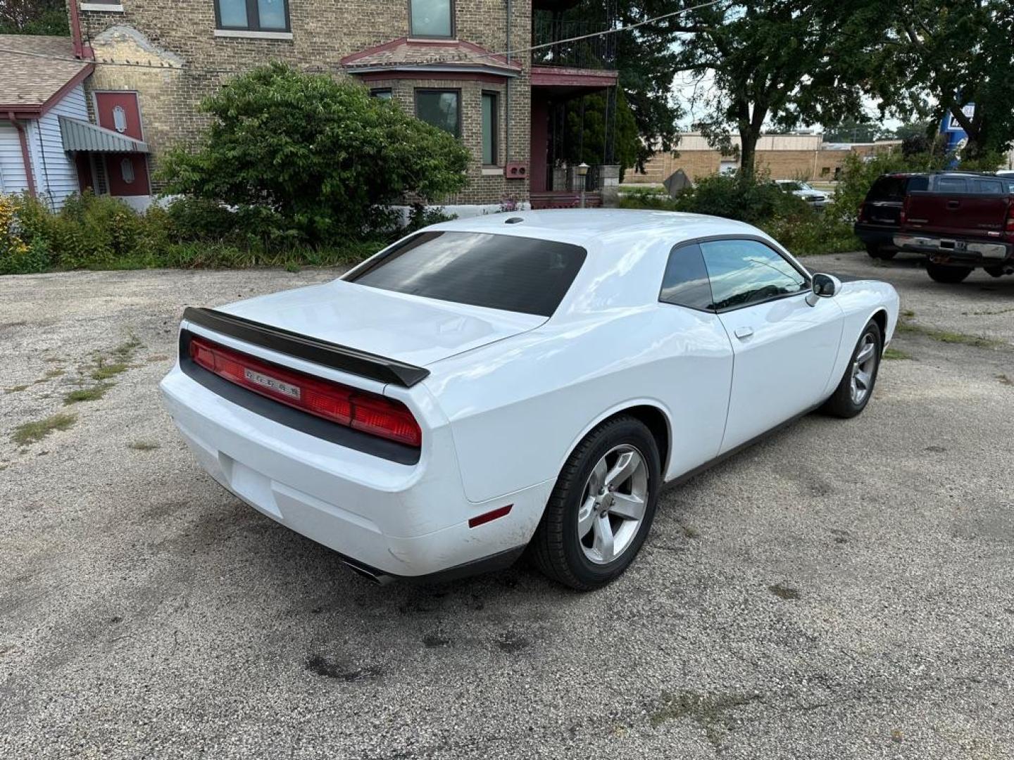 2012 WHITE DODGE CHALLENGER SXT (2C3CDYAG0CH) with an 3.6L engine, Automatic transmission, located at 1708 Broadway, Rockford, IL, 61104, (815) 397-5010, 42.252522, -89.069359 - Photo#2