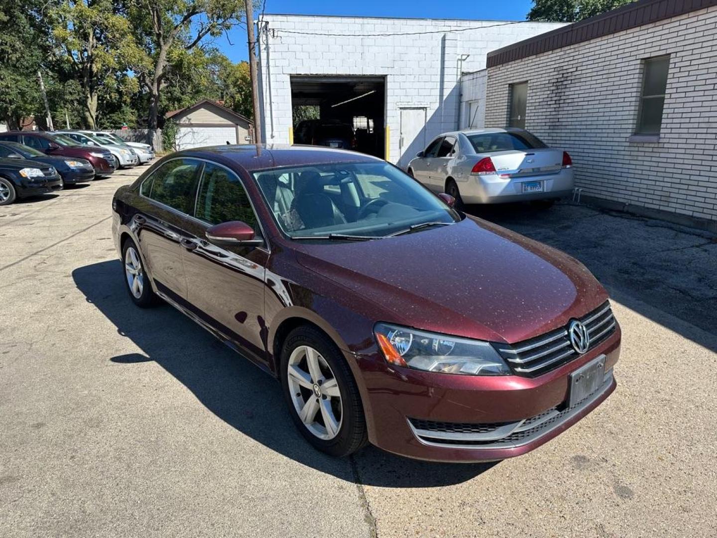 2012 MAROON VOLKSWAGEN PASSAT SE (1VWBP7A39CC) with an 2.5L engine, Automatic transmission, located at 1708 Broadway, Rockford, IL, 61104, (815) 397-5010, 42.252522, -89.069359 - Photo#1