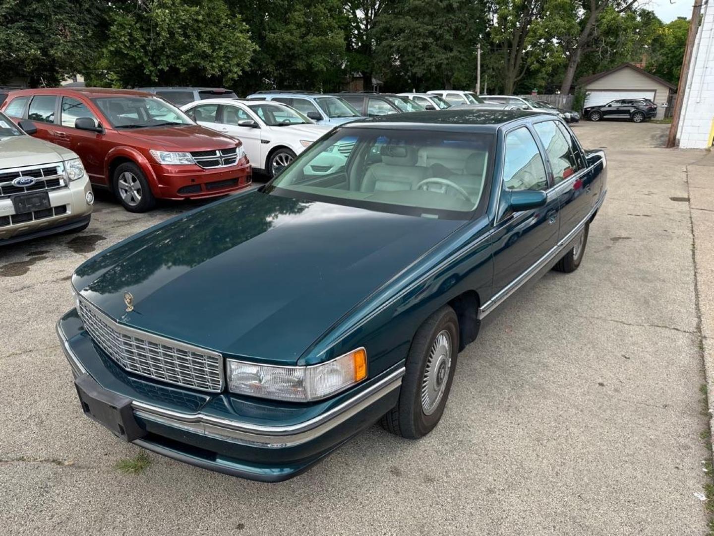 1995 GREEN CADILLAC DEVILLE (1G6KD52B9SU) with an 4.9L engine, Automatic transmission, located at 1708 Broadway, Rockford, IL, 61104, (815) 397-5010, 42.252522, -89.069359 - Photo#0