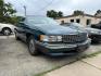 1995 GREEN CADILLAC DEVILLE (1G6KD52B9SU) with an 4.9L engine, Automatic transmission, located at 1708 Broadway, Rockford, IL, 61104, (815) 397-5010, 42.252522, -89.069359 - Photo#2