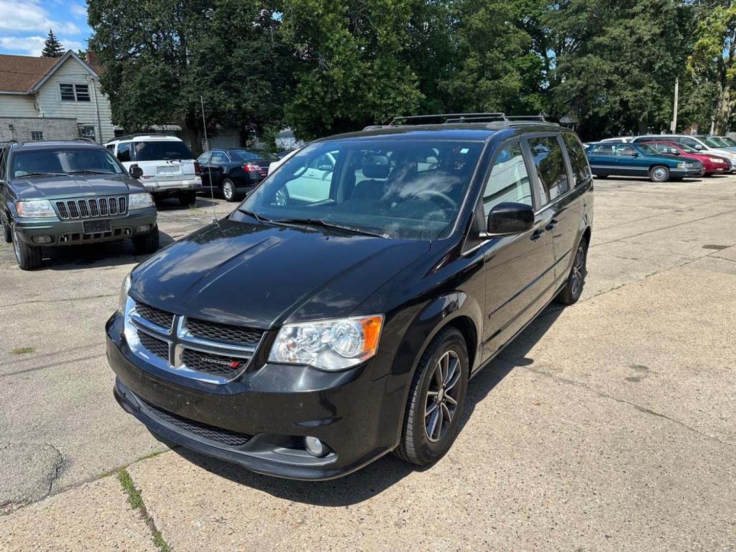 2017 BLACK DODGE GRAND CARAVAN SXT (2C4RDGCG0HR) with an 3.6L engine, Automatic transmission, located at 1708 Broadway, Rockford, IL, 61104, (815) 397-5010, 42.252522, -89.069359 - Photo#0