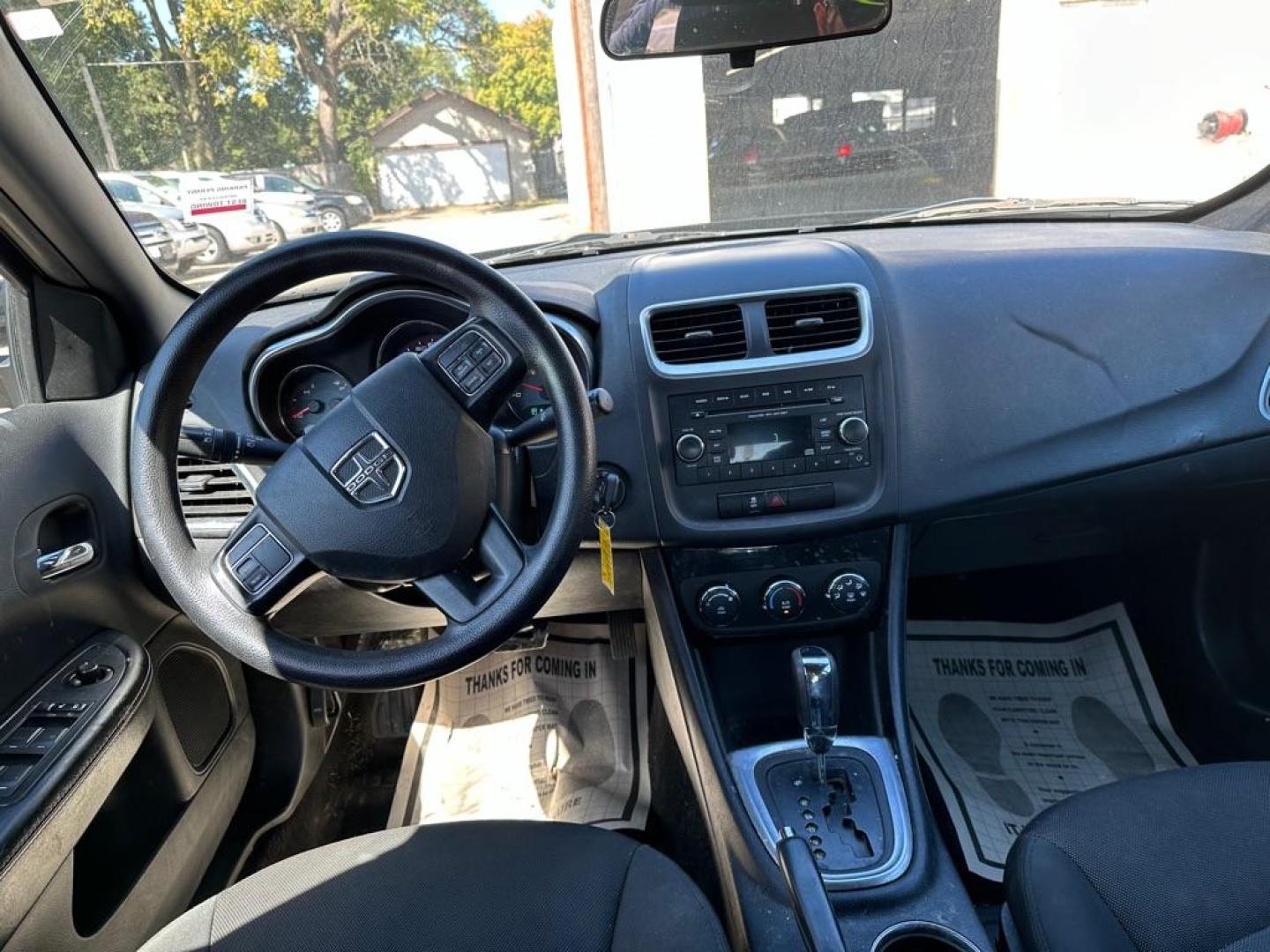 2014 BLACK DODGE AVENGER SE (1C3CDZAB9EN) with an 2.4L engine, Automatic transmission, located at 1708 Broadway, Rockford, IL, 61104, (815) 397-5010, 42.252522, -89.069359 - Photo#5