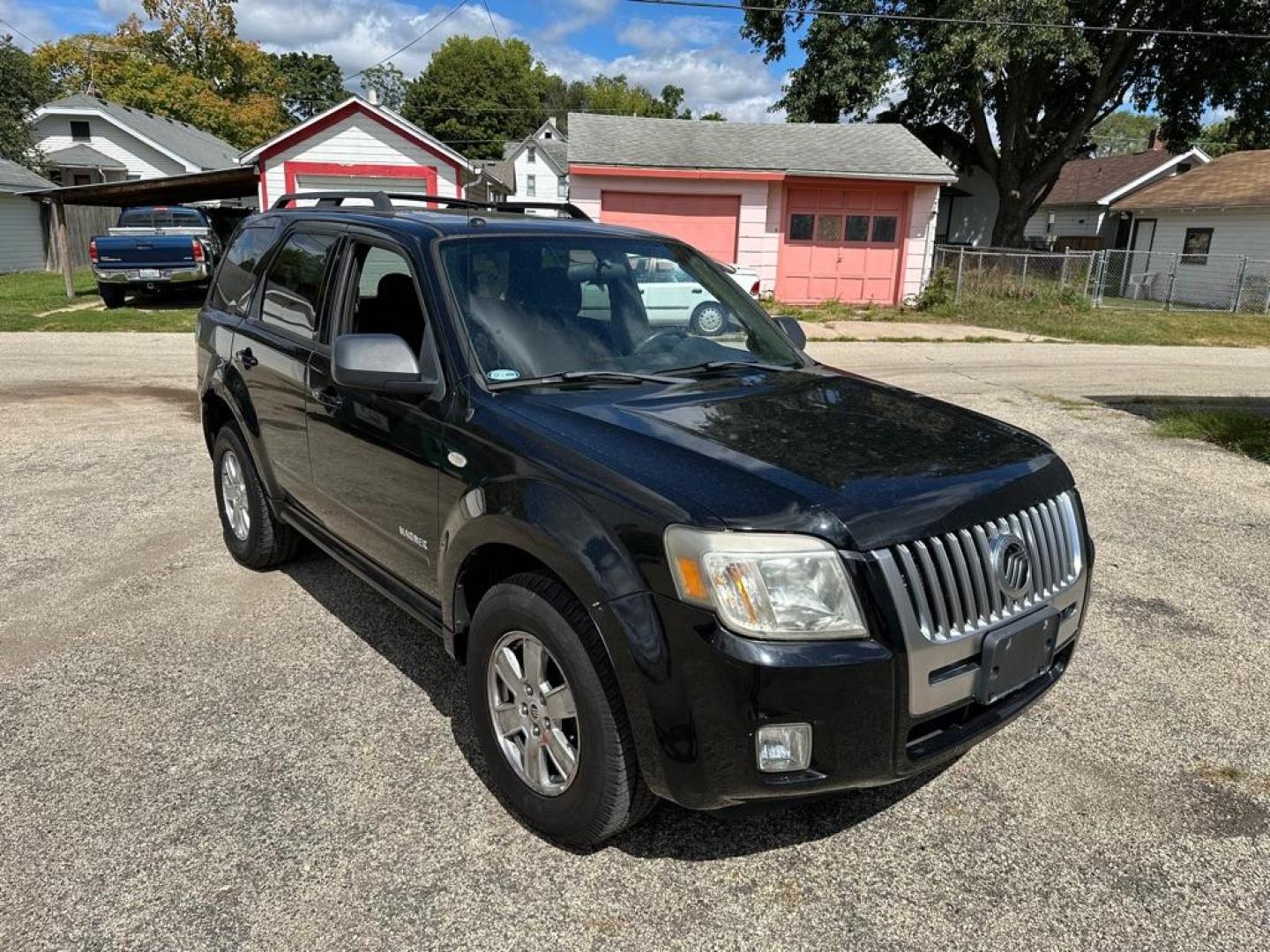 2008 BLACK MERCURY MARINER (4M2CU91178K) with an 3.0L engine, Automatic transmission, located at 1708 Broadway, Rockford, IL, 61104, (815) 397-5010, 42.252522, -89.069359 - Photo#1