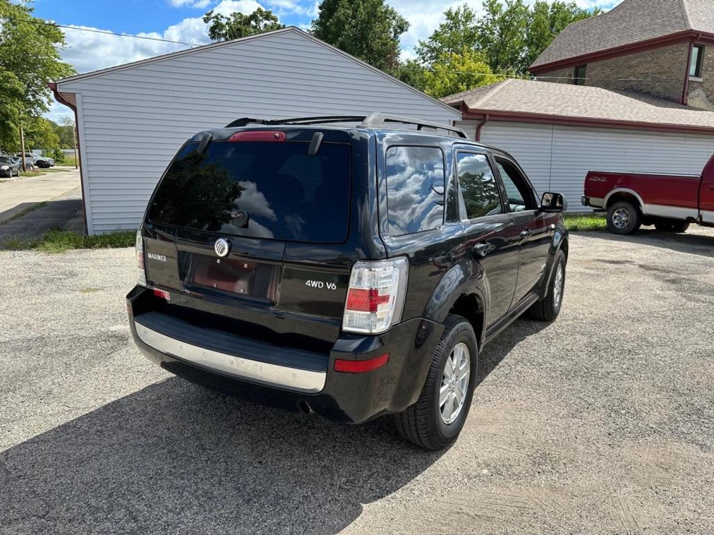 2008 BLACK MERCURY MARINER (4M2CU91178K) with an 3.0L engine, Automatic transmission, located at 1708 Broadway, Rockford, IL, 61104, (815) 397-5010, 42.252522, -89.069359 - Photo#2