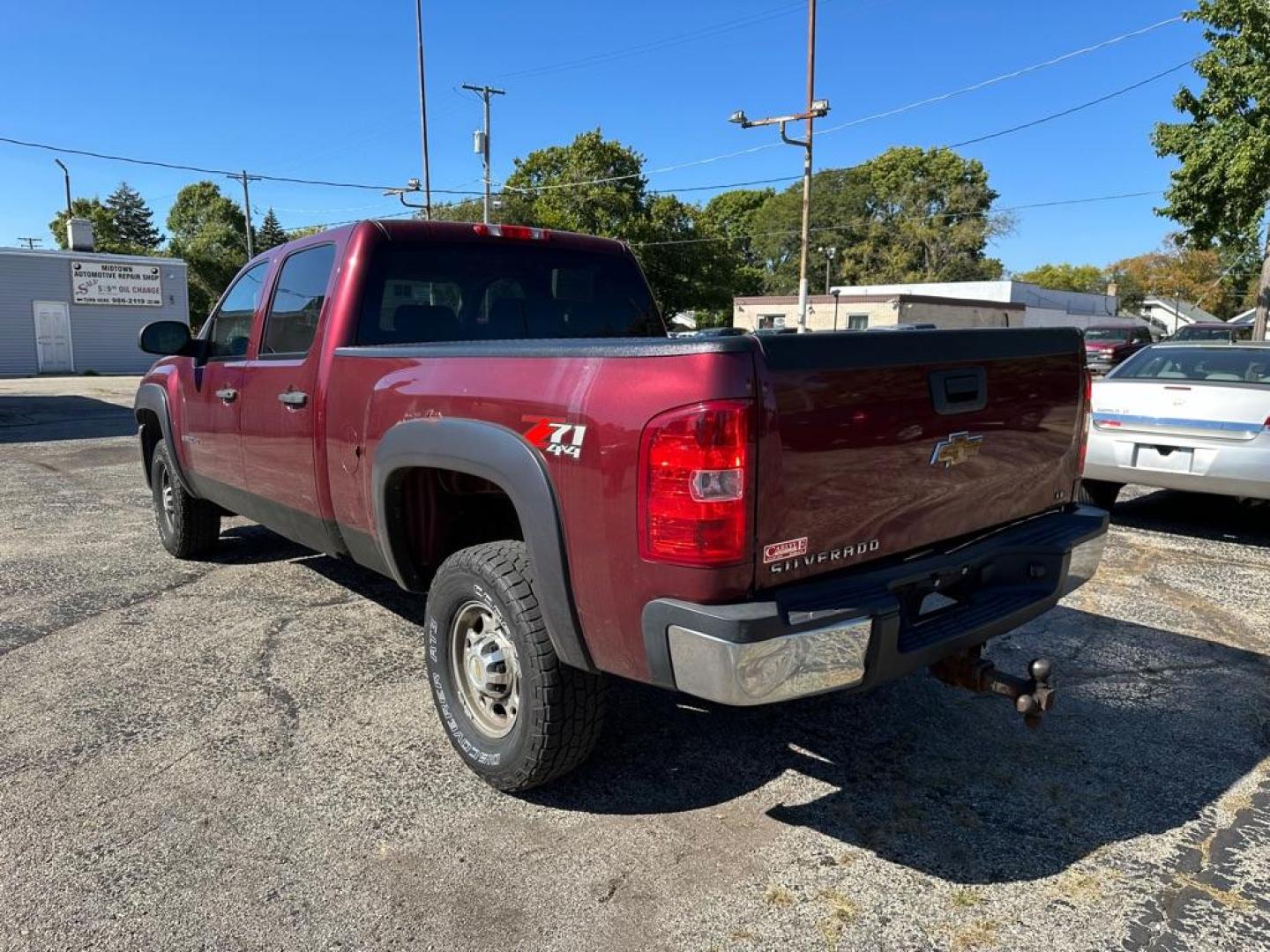 2008 MAROON CHEVROLET SILVERADO 2500 HEAVY DUTY (1GCHK23608F) with an 6.6L engine, Automatic transmission, located at 1708 Broadway, Rockford, IL, 61104, (815) 397-5010, 42.252522, -89.069359 - Photo#6