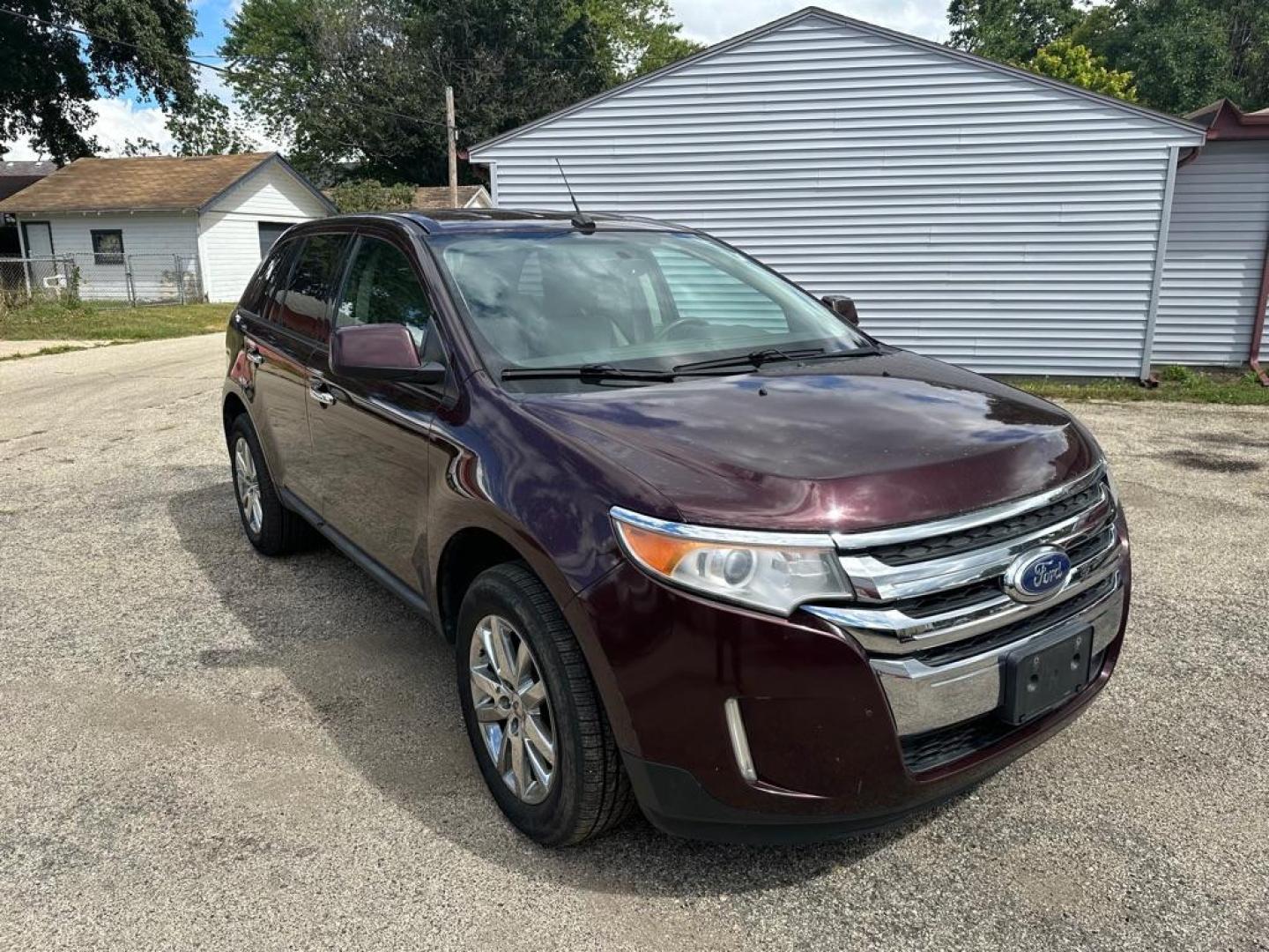 2011 MAROON FORD EDGE SEL (2FMDK4JC5BB) with an 3.5L engine, Automatic transmission, located at 1708 Broadway, Rockford, IL, 61104, (815) 397-5010, 42.252522, -89.069359 - Photo#1