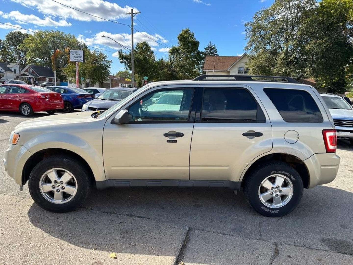 2012 GOLD FORD ESCAPE XLT (1FMCU0DG7CK) with an 3.0L engine, Automatic transmission, located at 1708 Broadway, Rockford, IL, 61104, (815) 397-5010, 42.252522, -89.069359 - Photo#3