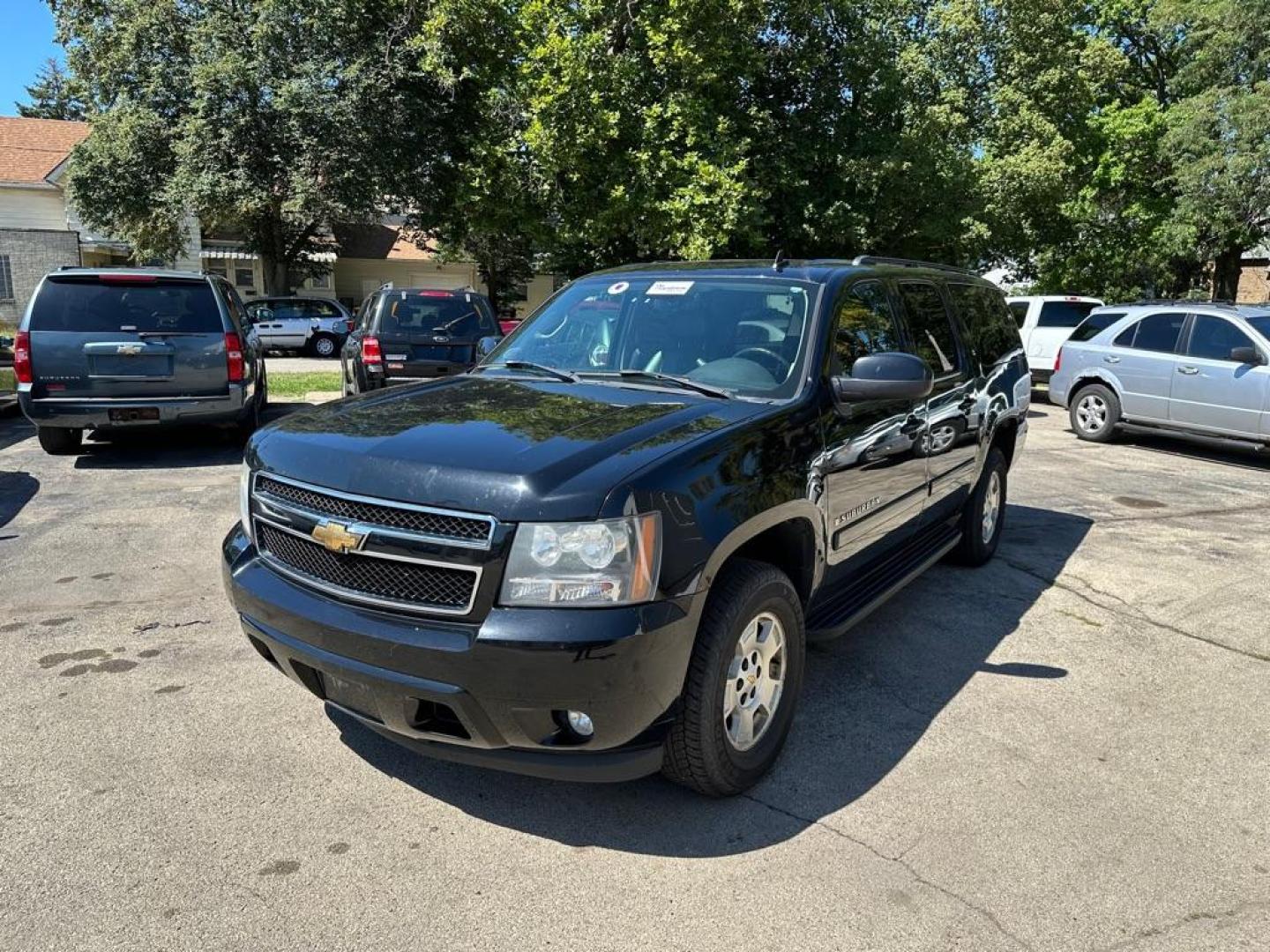 2007 BLACK CHEVROLET SUBURBAN 1500 (1GNFC16057J) with an 5.3L engine, Automatic transmission, located at 1708 Broadway, Rockford, IL, 61104, (815) 397-5010, 42.252522, -89.069359 - Photo#0