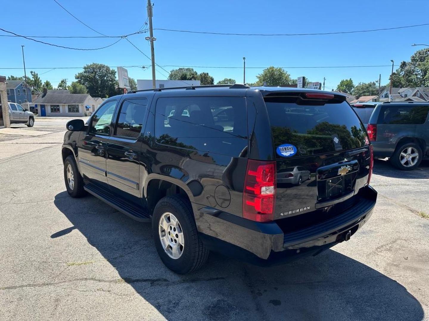 2007 BLACK CHEVROLET SUBURBAN 1500 (1GNFC16057J) with an 5.3L engine, Automatic transmission, located at 1708 Broadway, Rockford, IL, 61104, (815) 397-5010, 42.252522, -89.069359 - Photo#3