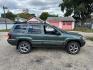 2002 GREEN JEEP GRAND CHEROKEE OVERLAND (1J8GW68JX2C) with an 4.7L engine, Automatic transmission, located at 1708 Broadway, Rockford, IL, 61104, (815) 397-5010, 42.252522, -89.069359 - Photo#2