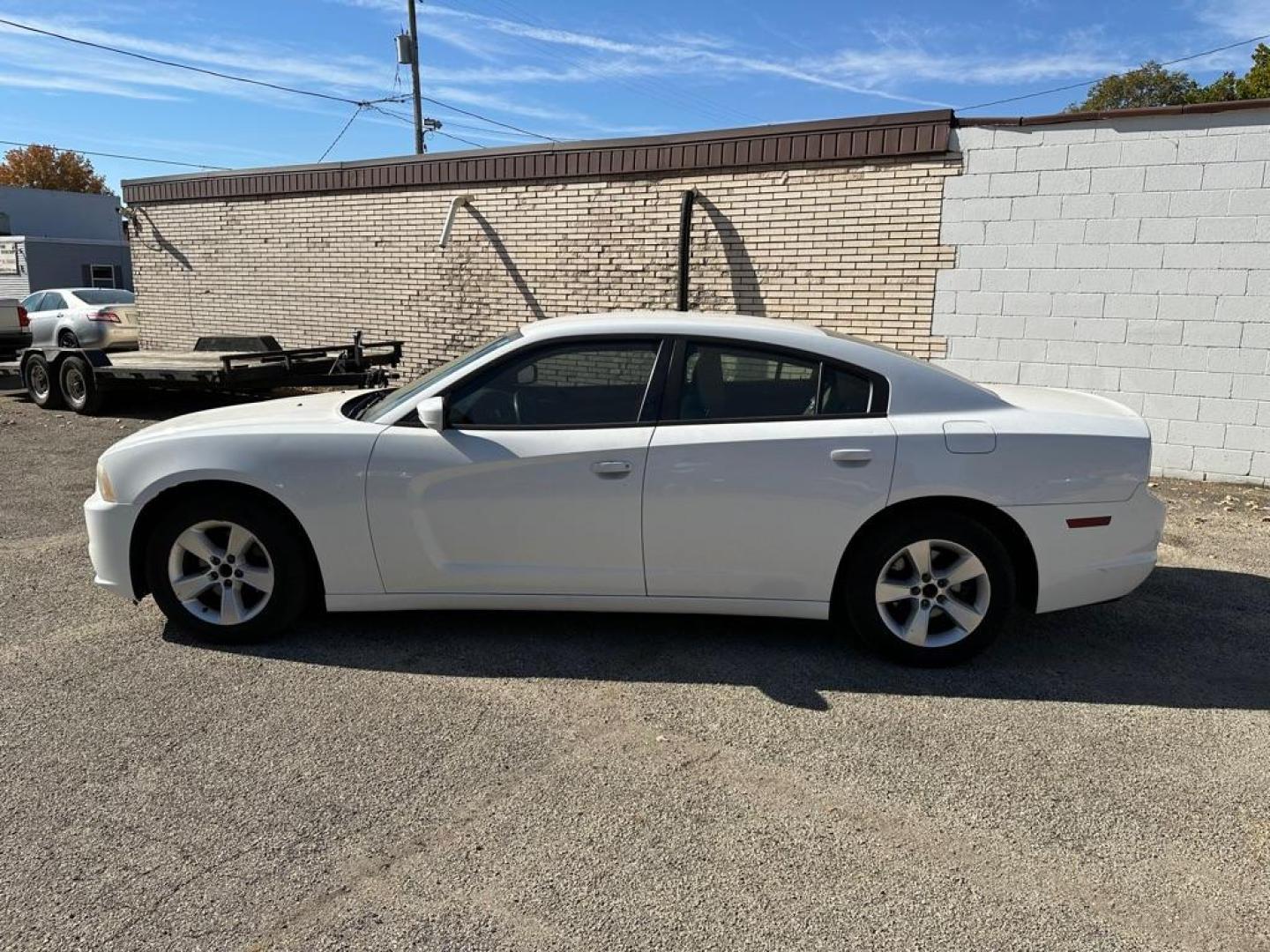 2014 WHITE DODGE CHARGER SE (2C3CDXBG4EH) with an 3.6L engine, Automatic transmission, located at 1708 Broadway, Rockford, IL, 61104, (815) 397-5010, 42.252522, -89.069359 - Photo#7