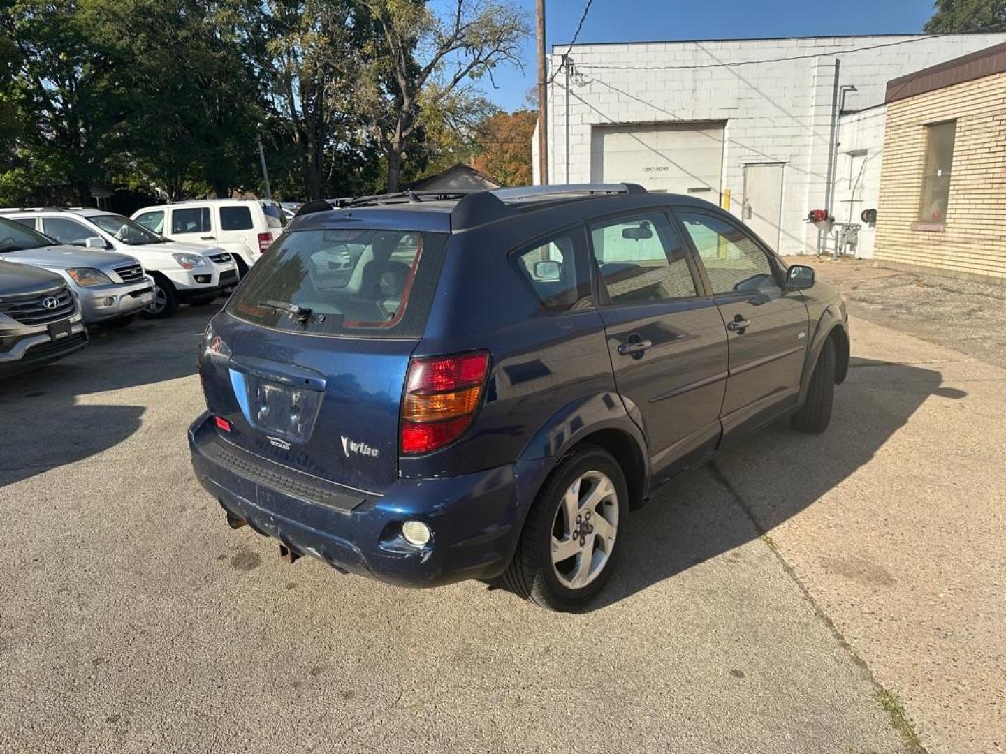 2004 BLUE PONTIAC VIBE (5Y2SL62834Z) with an 1.8L engine, Automatic transmission, located at 1708 Broadway, Rockford, IL, 61104, (815) 397-5010, 42.252522, -89.069359 - Photo#3