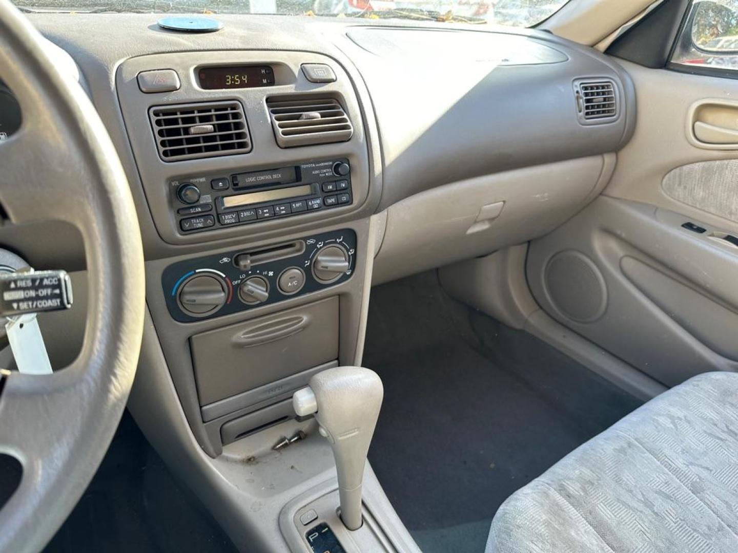 1998 BLACK TOYOTA COROLLA VE (1NXBR18E4WZ) with an 1.8L engine, Automatic transmission, located at 1708 Broadway, Rockford, IL, 61104, (815) 397-5010, 42.252522, -89.069359 - Photo#11