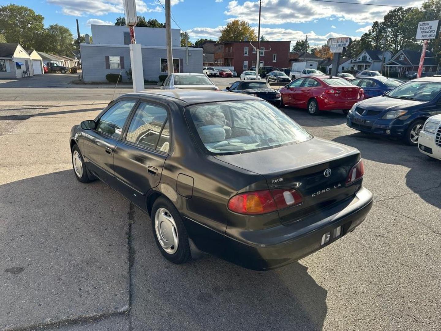 1998 BLACK TOYOTA COROLLA VE (1NXBR18E4WZ) with an 1.8L engine, Automatic transmission, located at 1708 Broadway, Rockford, IL, 61104, (815) 397-5010, 42.252522, -89.069359 - Photo#2