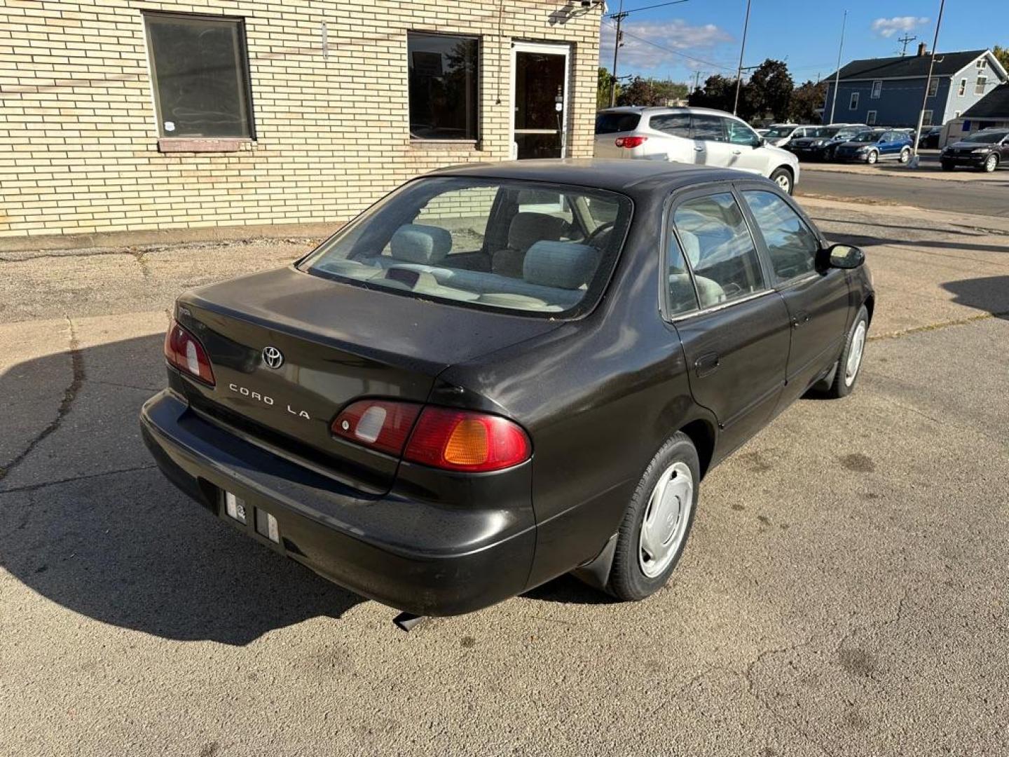 1998 BLACK TOYOTA COROLLA VE (1NXBR18E4WZ) with an 1.8L engine, Automatic transmission, located at 1708 Broadway, Rockford, IL, 61104, (815) 397-5010, 42.252522, -89.069359 - Photo#4