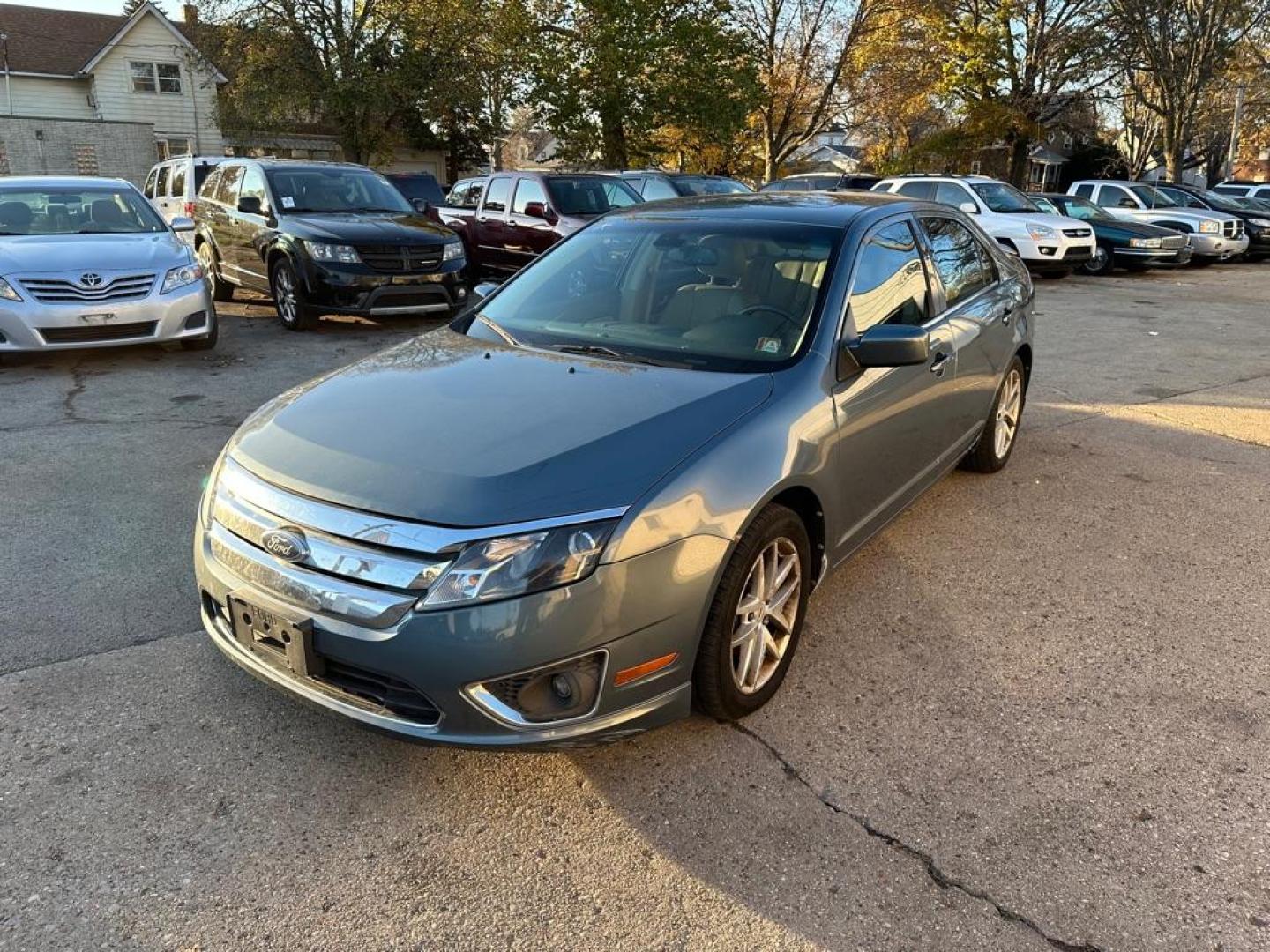 2011 BLUE FORD FUSION SEL (3FAHP0JA9BR) with an 2.5L engine, Automatic transmission, located at 1708 Broadway, Rockford, IL, 61104, (815) 397-5010, 42.252522, -89.069359 - Photo#0