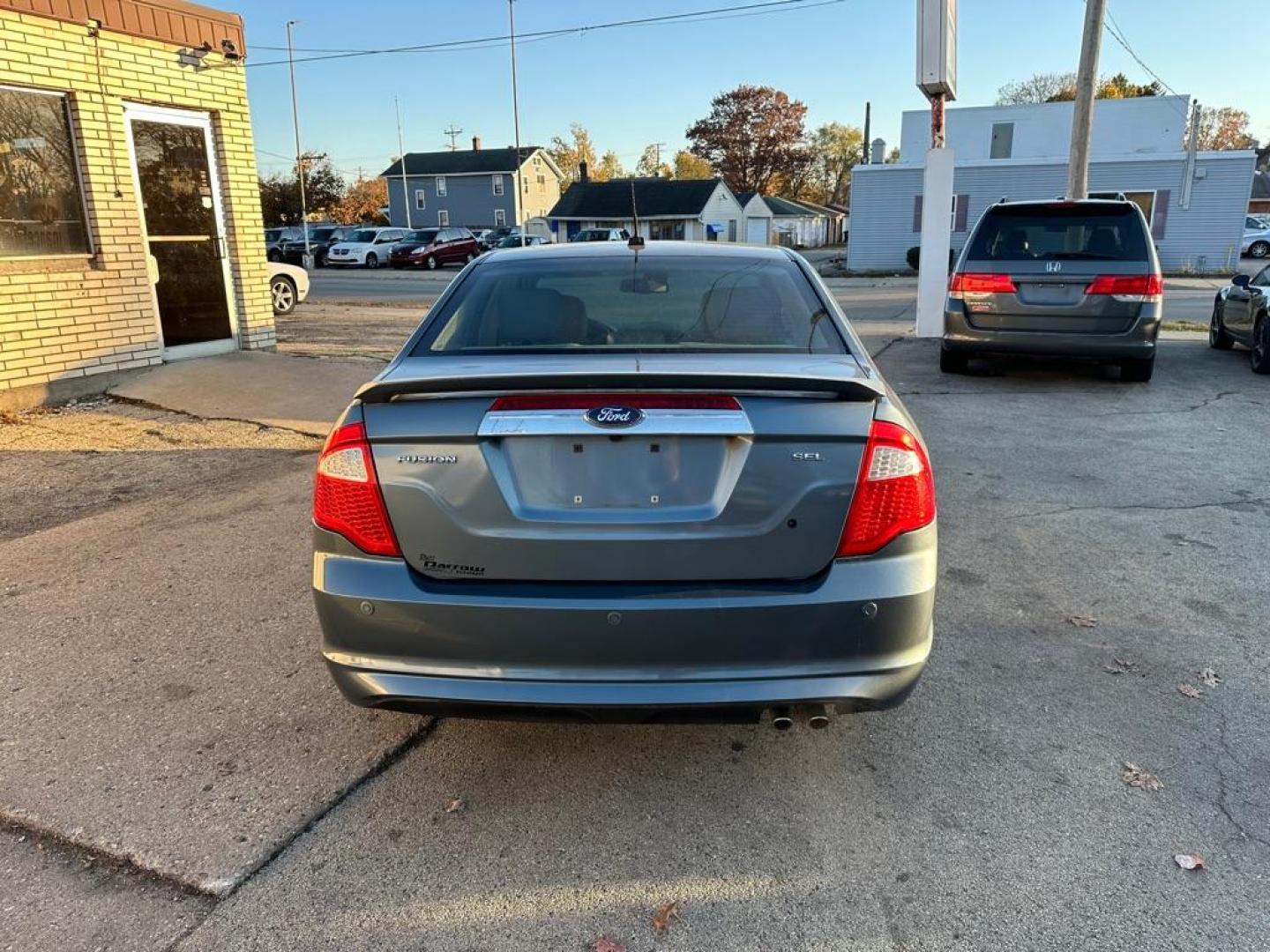 2011 BLUE FORD FUSION SEL (3FAHP0JA9BR) with an 2.5L engine, Automatic transmission, located at 1708 Broadway, Rockford, IL, 61104, (815) 397-5010, 42.252522, -89.069359 - Photo#5