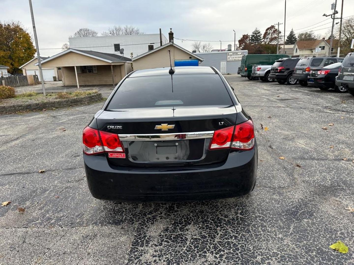 2015 BLACK CHEVROLET CRUZE LT (1G1PC5SBXF7) with an 1.4L engine, Automatic transmission, located at 1708 Broadway, Rockford, IL, 61104, (815) 397-5010, 42.252522, -89.069359 - Photo#5