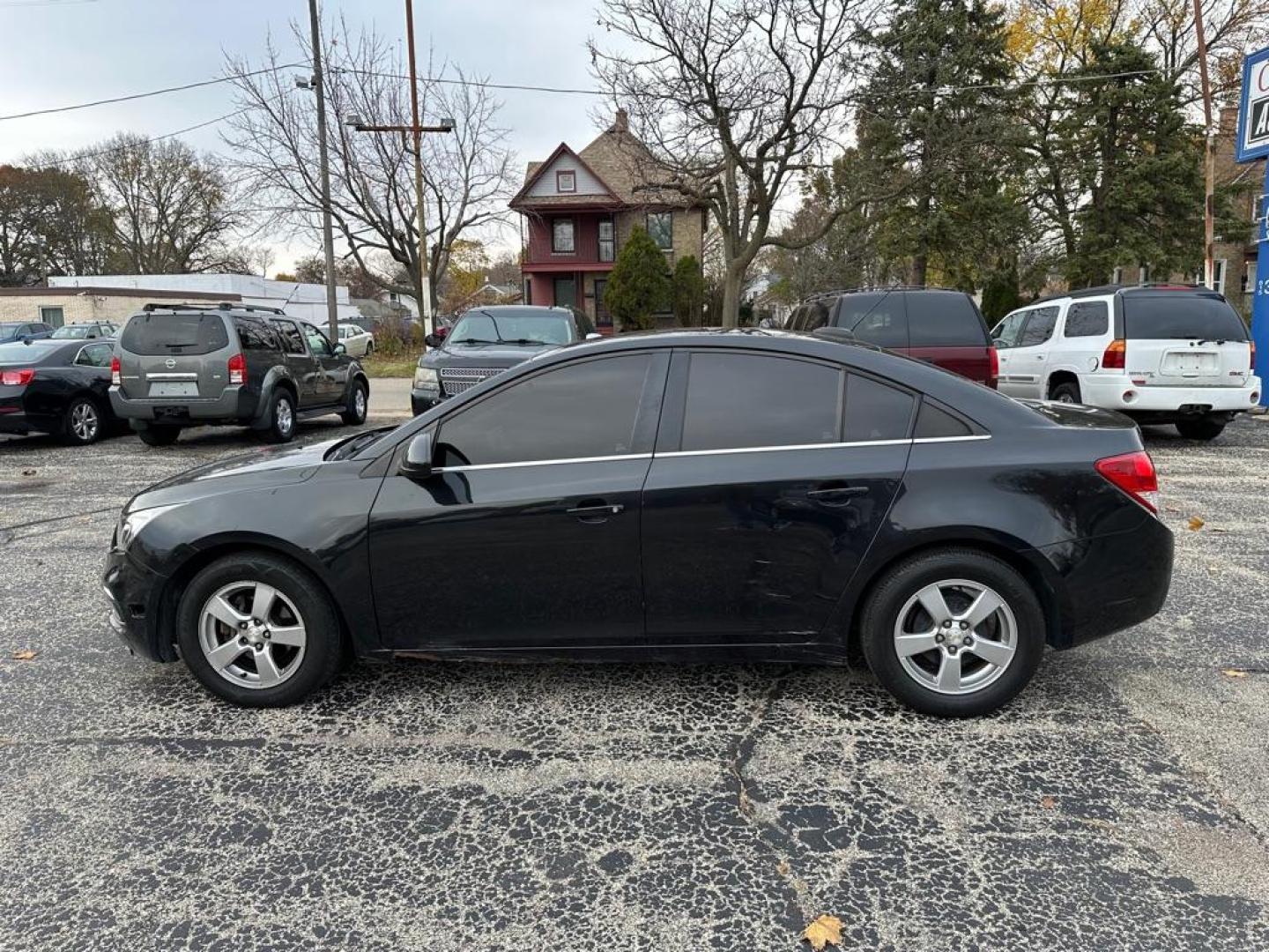 2015 BLACK CHEVROLET CRUZE LT (1G1PC5SBXF7) with an 1.4L engine, Automatic transmission, located at 1708 Broadway, Rockford, IL, 61104, (815) 397-5010, 42.252522, -89.069359 - Photo#7