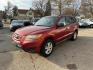 2010 RED HYUNDAI SANTA FE GLS (5NMSG3AB3AH) with an 2.4L engine, Automatic transmission, located at 1708 Broadway, Rockford, IL, 61104, (815) 397-5010, 42.252522, -89.069359 - Photo#0