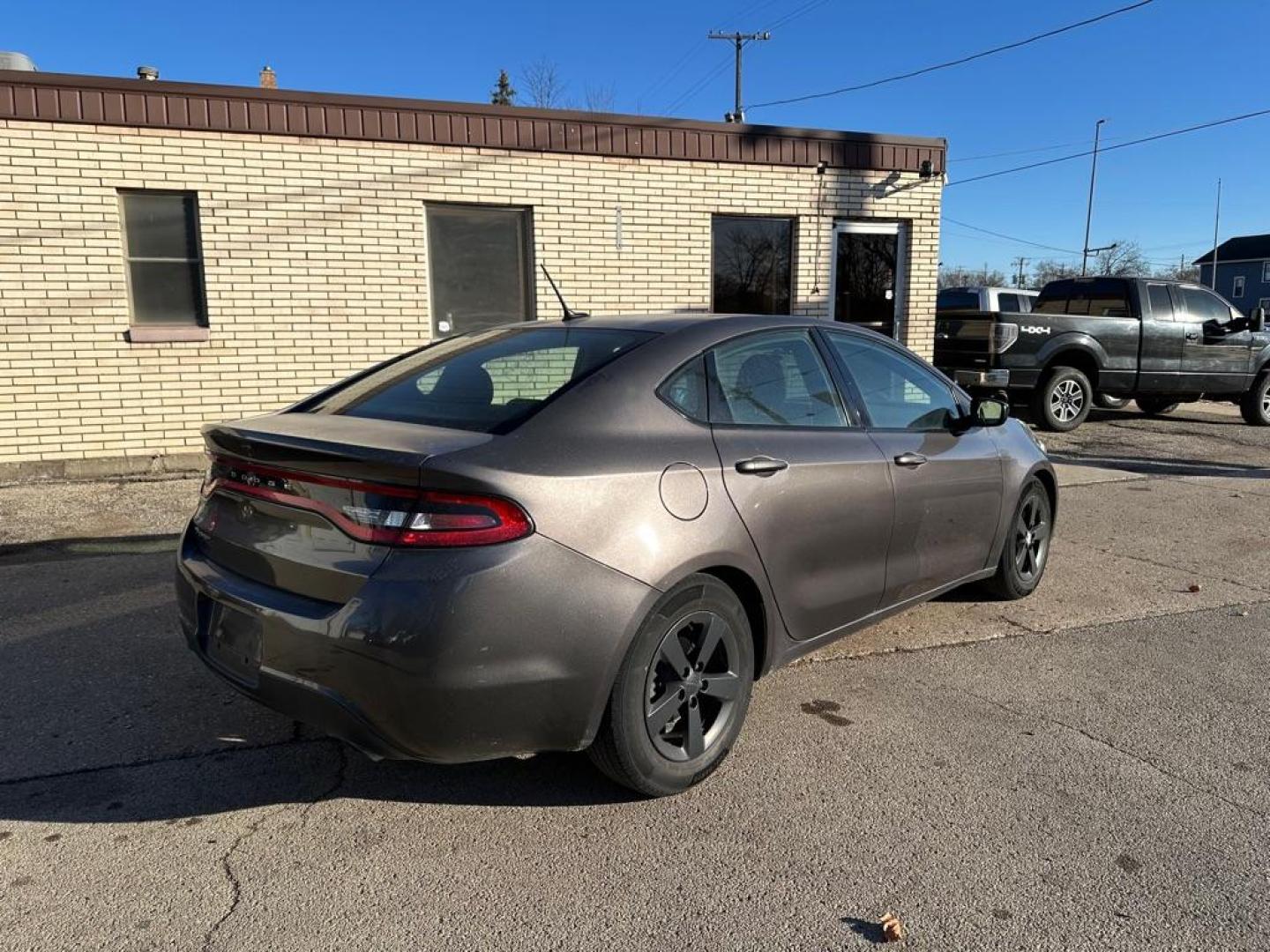 2016 GRAY DODGE DART SXT (1C3CDFBB3GD) with an 2.4L engine, 6-Speed Manual transmission, located at 1708 Broadway, Rockford, IL, 61104, (815) 397-5010, 42.252522, -89.069359 - Photo#4