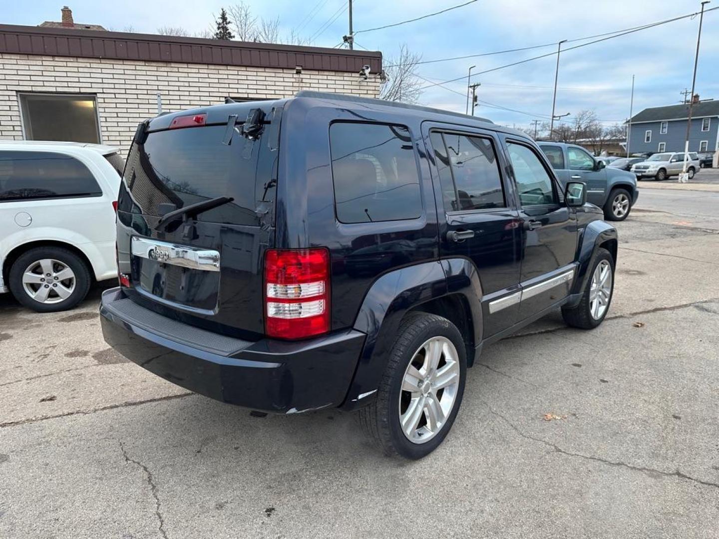 2011 BLACK JEEP LIBERTY SPORT (1J4PN2GK1BW) with an 3.7L engine, Automatic transmission, located at 1708 Broadway, Rockford, IL, 61104, (815) 397-5010, 42.252522, -89.069359 - Photo#2