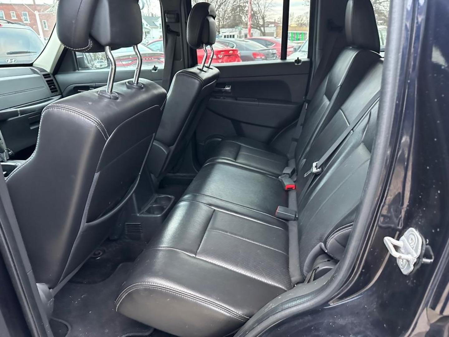 2011 BLACK JEEP LIBERTY SPORT (1J4PN2GK1BW) with an 3.7L engine, Automatic transmission, located at 1708 Broadway, Rockford, IL, 61104, (815) 397-5010, 42.252522, -89.069359 - Photo#5