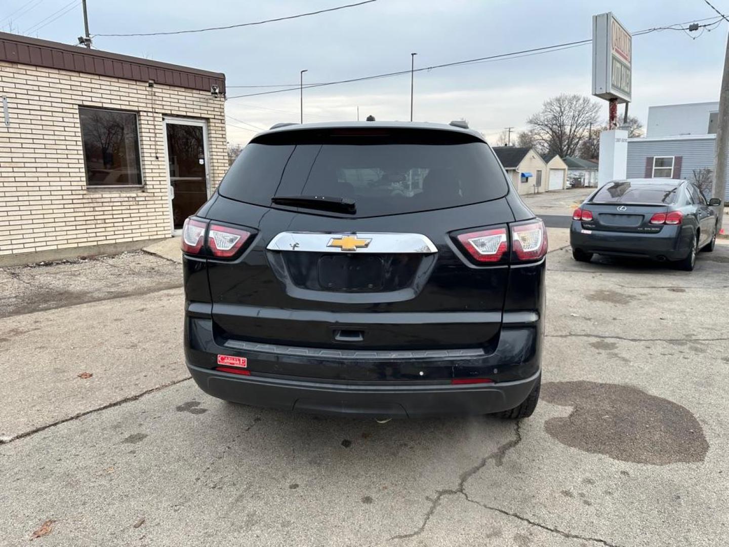 2013 BLACK CHEVROLET TRAVERSE LT (1GNKVGKD1DJ) with an 3.6L engine, Automatic transmission, located at 1708 Broadway, Rockford, IL, 61104, (815) 397-5010, 42.252522, -89.069359 - Photo#5